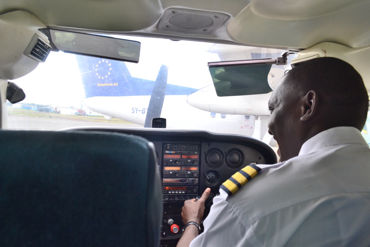 Pilot in Cessna cockpit during flight training at Standards Aviation flight school Nairobi Kenya